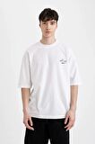 DeFacto Loose Fit Bisiklet Yaka Sırt Baskılı Kısa Kollu Tişört C2488AX24SMWT34