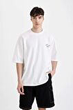 DeFacto Loose Fit Bisiklet Yaka Sırt Baskılı Kısa Kollu Tişört C2488AX24SMWT34