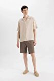 DeFacto Relax Fit Polo Yaka Pamuklu Yazlık Müslin Kısa Kollu Gömlek C7578AX24SMBG695