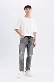 DeFacto %100 Pamuk 90's Slim Fit Dar Kalıp Yüksek Bel Dar Paça Yırtık Detaylı Jean Pantolon C9829AX24SMNM55