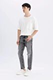 DeFacto %100 Pamuk 90's Slim Fit Dar Kalıp Yüksek Bel Dar Paça Yırtık Detaylı Jean Pantolon C9829AX24SMNM55