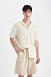 DeFacto Relax Fit Pamuklu Cepli Basic Düz Bermuda Şort C7589AX24SMBG695