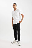 DeFactoFit Dokuma Esnek Multifonksiyonel Sporcu Jogger Eşofman Altı Slim Fit Dar Kesim Çift Cepli C1212AX24AUBK81