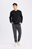 DeFacto Slim Fit Dar Kesim Jogger Eşofman Altı Basic Düz Pike Beli Bağcıklı Lastikli Paça Cepli  R9262AZ24AUAR184
