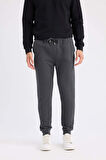 DeFacto Slim Fit Dar Kesim Jogger Eşofman Altı Basic Düz Pike Beli Bağcıklı Lastikli Paça Cepli  R9262AZ24AUAR184