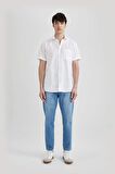 DeFacto Slim Fit Dar Kesim Yazlık Basic Düz %100 Pamuk Kısa Kollu Beyaz Gömlek R1706AZ24SMWT34