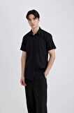 DeFacto Slim Fit Dar Kesim Yazlık Basic Düz %100 Pamuk Kısa Kollu Gömlek R1706AZ24SMBK81