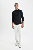 DeFactoFit Slim Fit Dik Yaka Baskılı Uzun Kollu Sporcu Tişört C9493AX24AUBK81