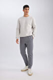 DeFacto Relax Fit Kalın Jogger Eşofman Altı Basic Düz Beli Bağcıklı Lastikli Paça Cepli  U7438AZ24AUGR439