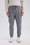 DeFacto Relax Fit Kalın Jogger Eşofman Altı Basic Düz Beli Bağcıklı Lastikli Paça Cepli  U7438AZ24AUGR439