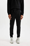 DeFactoFit Sporcu Jogger Eşofman Altı Slim Fit Dar Kesim Skuba Dalgıç Kumaş Standart Paça C0485AX24AUBK81