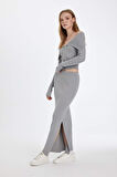 DeFacto Slim Fit Dar Kesim Esnek Belli Basic Düz Yırtmaçlı Maxi Triko Etek D5390AX24AUGR90