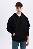 DeFacto Siyah Oversize Geniş Kalıp Kapüşonlu Kanguru Cepli Basic Düz Sweatshirt A4331AX24AUBK81