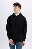 DeFacto Siyah Oversize Geniş Kalıp Kapüşonlu Kanguru Cepli Basic Düz Sweatshirt A4331AX24AUBK81