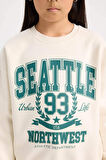 DeFacto Kız Çocuk Relax Fit Bisiklet Yaka Baskılı Sweatshirt D7057A824WNER99