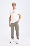 DeFactoFit Slim Fit Dokuma Sporcu Jogger Eşofman Altı Dar Kesim Çift Cepli
