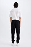 DeFacto Regular Fit Jogger Eşofman Altı Kargo Cepli Basic Düz Beli Bağcıklı Lastikli Paça Y5533AZ24AUBK81