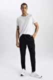 DeFactoFit Sporcu Jogger Eşofman Altı Slim Fit Dar Kesim Dokuma Üç Cepli Fermuarlı Paça B2780AX24SMBK81