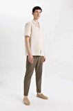 DeFacto Relax Fit Rahat Kesim Düz Paça Krinkıl Yazlık Kumaş Pantolon C3930AX24SMKH264
