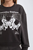 DeFacto Kız Çocuk Oversize Geniş Kalıp Bisiklet Yaka Baskılı Sweatshirt D4386A824WNAR227