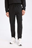 DeFactoFit Standart Fit Sporcu Jogger Eşofman Altı Standart Paça Skuba Dalgıç Kumaş D7308AX25SPBK81