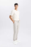 DeFacto Yazlık Jogger Pantolon Slim Fit Dar Kesim Beli Bağcıklı Cepli Düz Paça D8638AX24AUGR107
