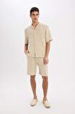 DeFacto %100 Pamuk Relax Fit Müslin Cepli Basic Düz Bermuda Şort C7589AX25SMBG695