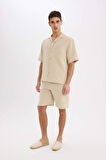 DeFacto %100 Pamuk Relax Fit Müslin Cepli Basic Düz Bermuda Şort C7589AX25SMBG695