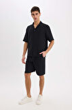 DeFacto %100 Pamuk Relax Fit Müslin Cepli Basic Düz Bermuda Şort C7589AX25SMBK81