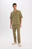 DeFacto %100 Pamuk Relax Fit Rahat Kesim Yazlık Müslin Kısa Paça Pamuklu Jogger Pantolon D6144AX25SMKH436