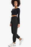 DeFactoFit Standart Fit Çift Cepli Paçası Lastikli Standart Boy Sporcu Eşofman Altı A4557AX25SPBK81