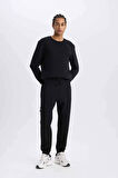 DeFactoFit NBA Brooklyn Nets Jogger Eşofman Altı Standart Fit Cepli Skuba Dalgıç Kumaş Beli Bağcıklı Lastikli Paça D8677AX25SPBK81