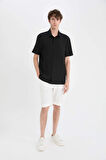 DeFacto Regular Fit Polo Yaka Krinkıl Yazlık Kısa Kollu Siyah Gömlek E1223AX25SMBK27