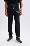 DeFactoFit NBA Milwaukee Bucks Kalın Jogger Eşofman Altı Standart Fit Cepli Beli Bağcıklı Lastikli Paça D6692AX25SPBK82