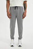 DeFactoFit Slim Fit Sporcu Jogger Eşofman Altı Dar Kesim Skuba Dalgıç Kumaş Standart Paça Beli Bağcıklı Lastikli Paça Z9112AZ24AUGR519