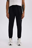 DeFactoFit Slim Fit Sporcu Jogger Eşofman Altı Dar Kesim Skuba Dalgıç Kumaş Standart Paça Beli Bağcıklı Lastikli Paça Z9112AZ25SPBK81