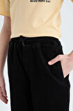 DeFacto Erkek Çocuk Jogger Fit Esnek Bantlı Paça Jean Pantolon D6552A825SPNM40