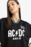 DeFacto Coool AC/DC Oversize Geniş Kalıp V Yaka Sırt Baskılı Kısa Kollu Tişört E6137AX25SMBK81