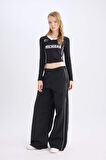 DeFacto Coool Wide Leg Geniş Bol Paça Cepli Şerit Detaylı Normal Bel Pantolon D4404AX24AUBK27