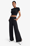 DeFactoFit Wide Leg Cepli Geniş Paça Yırtmaçlı Uzun Sporcu Pantolon E2538AX25SMBK81