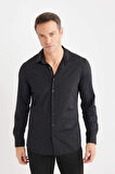DeFacto Slim Fit Dar Kesim Polo Yaka Esnek Kumaş Basic Düz Uzun Kollu Siyah Gömlek B6491AX25SPBK81