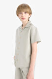 DeFacto Erkek Çocuk Oversize Geniş Kalıp Polo Yaka Müslin Kısa Kollu Gömlek E3314A825HSGN1123
