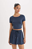 DeFactoFit Crop Top Bisiklet Yaka Sporcu Kısa Kollu Tişört E2663AX25SMNV249