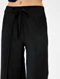 Yandan Kapak Detaylı Bol Paça Pantolon Bağlamalı Aerobin Kumaş