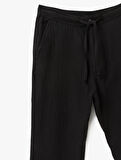 Pamuklu Müslin Chino Cep Detaylı Beli Bağcıklı Jogger Pantolon