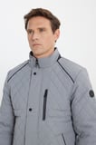 Standart Fit Normal Kesim Dik Yaka Kapitone Desenli Çıtçıtlı Yan Cepli Overcoat