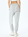 Düşük Bel Dikiş Detaylı Cepli Beli Bağcıklı Jogger Eşofman Altı