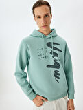 Uzun Kollu Pamuk Karışımlı Şardonlu Kapşonlu Baskılı Sweatshirt