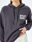 Arkası Baskılı Kapüşonlu Oversize Sweatshirt