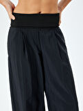 Cepli Düşük Bel Geniş Paça Paraşüt Kumaş Pantolon